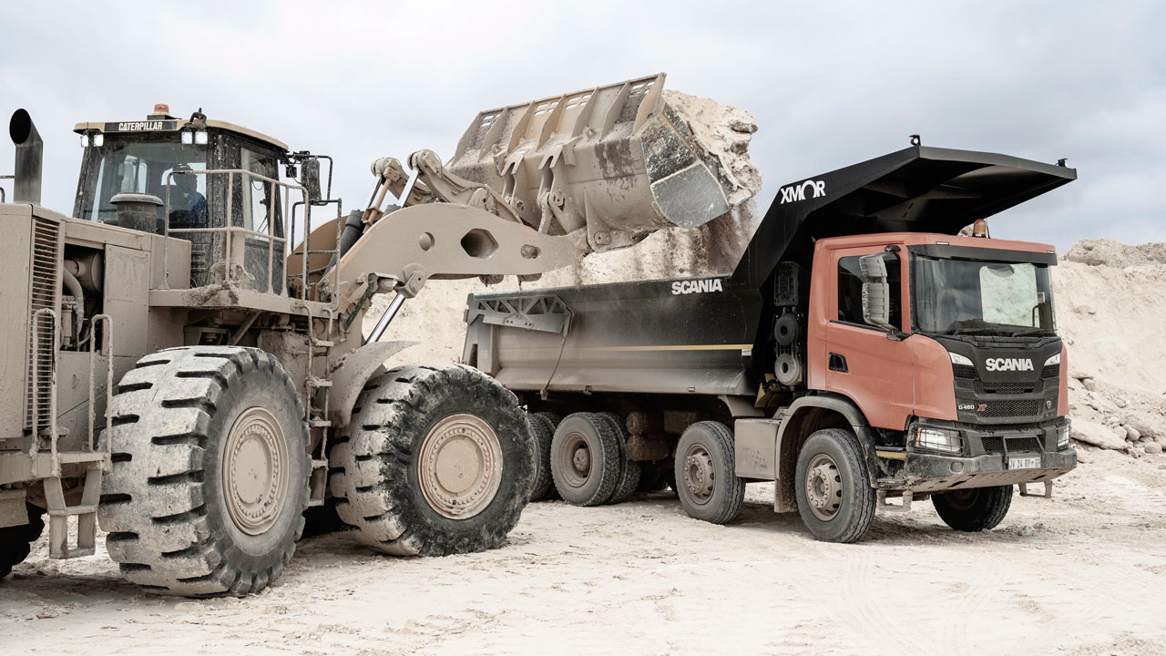 Excavator loading a tipper